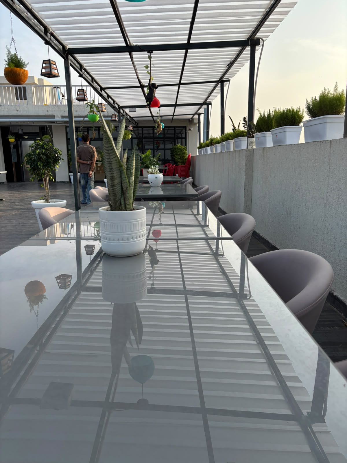 Rooftop table under hanging lights
